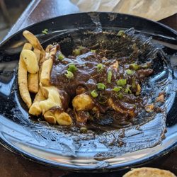 The Celt - Poutine. The gravy was rich and the cheese curds amazing! Everyone dove in before I could take a pic it was that good. Highly recommend!