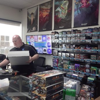 Black Dragon Games - The staff is friendly and knowledgeable (check out the display screen behind the counter - zoom in for their Discord address) - Hobby Shops Near Me - Twin Falls, Idaho