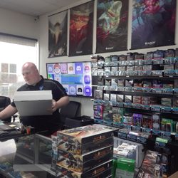 Black Dragon Games - The staff is friendly and knowledgeable (check out the display screen behind the counter - zoom in for their Discord address)