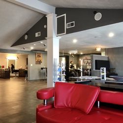 J Danielle Salon & Color Studio - Waiting area I had seen from a distance a gentleman receiving a straight razor shave