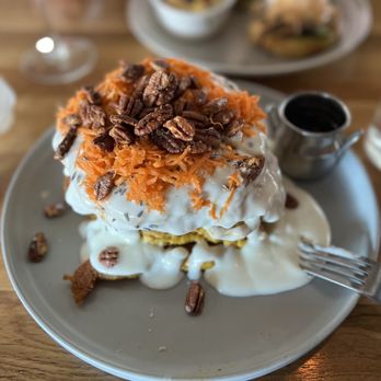 Whiskey Cake - Carrot cake pancake stack with lavender icing - New American Near Me - Irving, Texas Whiskey Cake - Carrot cake pancake stack with lavender icing - New American Near Me - Irving, Texas