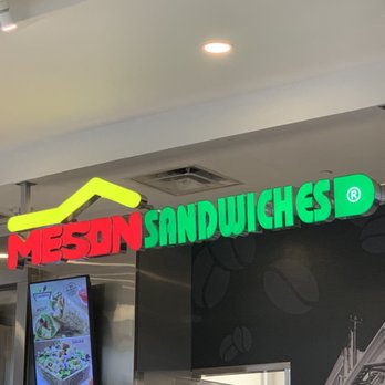 Meson Sandwiches - a sign in a restaurant - Coffee & Tea Near Me - Orlando, Florida