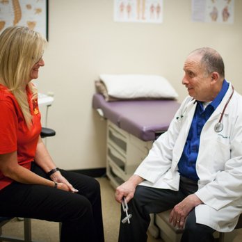 Sheitelman Physical Medicine - Free consultations! Dr. Gootzeit D.O. discussing regenerative medicine options with a patient. - Chiropractors Near Me - Surprise, Arizona Sheitelman Physical Medicine - Free consultations! Dr. Gootzeit D.O. discussing regenerative medicine options with a patient. - Chiropractors Near Me - Surprise, Arizona