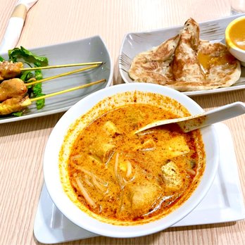 Cinta Ria Malaysian Restaurant - Chicken Satay Skewers, Tofu Laksa Curry Soup (spicy), and Roti Canai - Asian Fusion Near Me - Moncton, New Brunswick Cinta Ria Malaysian Restaurant - Chicken Satay Skewers, Tofu Laksa Curry Soup (spicy), and Roti Canai - Asian Fusion Near Me - Moncton, New Brunswick