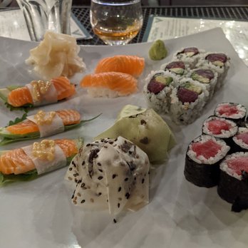 Stirling Sake - The sushi is incredible! Loves the salmon avocado appetizer (on the left) didn't love the mushroom roll (front middle) - Japanese Near Me - Greenport, New York