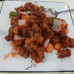 O-11. Salt & Pepper Pork Chop Over Rice