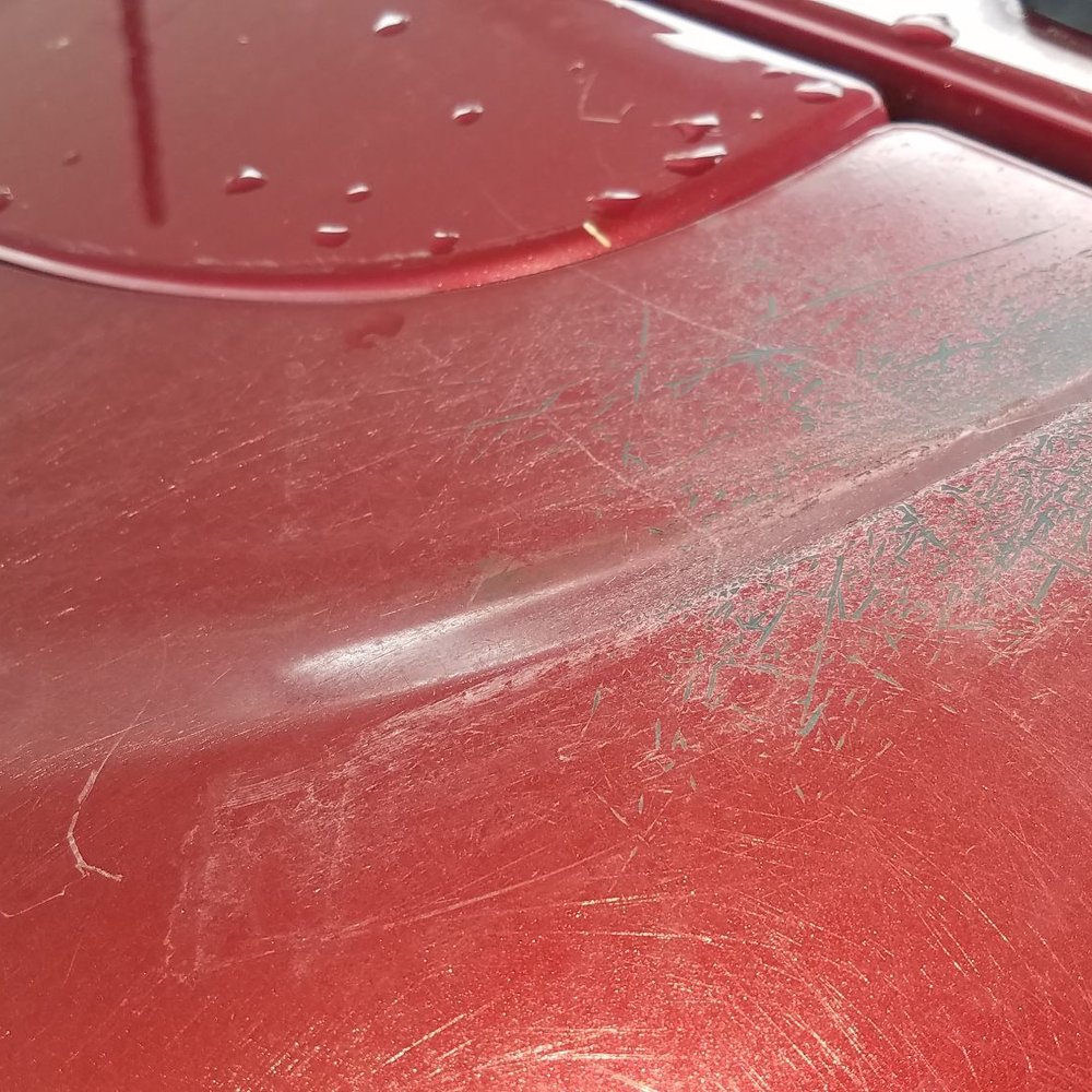Quick Quack Car Wash - Scratches on top of Jeep Cherokee back hatch wing. - Car Wash Near Me - Conroe, Texas