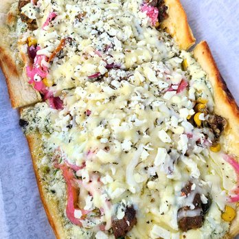 Mezeh Mediterranean Grill - Spicy Meat Lovers Mediterranean Pizza - Mediterranean Near Me - Charlotte, North Carolina Mezeh Mediterranean Grill - Spicy Meat Lovers Mediterranean Pizza - Mediterranean Near Me - Charlotte, North Carolina
