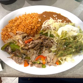 Blue Agave Mexican Kitchen - Fajita platter with pork carnitas. - Mexican Near Me - Colorado City, Arizona Blue Agave Mexican Kitchen - Fajita platter with pork carnitas. - Mexican Near Me - Colorado City, Arizona