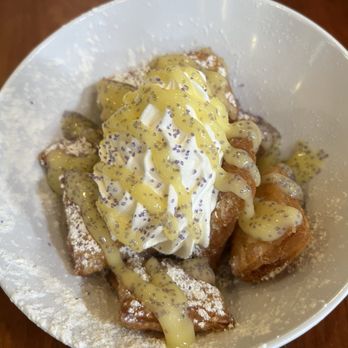 Ruby Slipper Central Business District - Regular beignets with whip cream and lemon curd - Breakfast & Brunch Near Me - New Orleans, Louisiana Ruby Slipper Central Business District - Regular beignets with whip cream and lemon curd - Breakfast & Brunch Near Me - New Orleans, Louisiana
