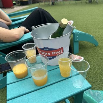 Bark Bar & Grille - Mimosa bucket - Hot Dogs Near Me - Little Rock, Arkansas