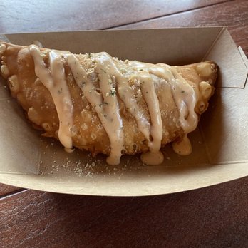 The Friar's Nook - Buffalo Hand Pie with spicy ranch drizzle and blue cheese powder - Cafes Near Me - Orlando, Florida The Friar's Nook - Buffalo Hand Pie with spicy ranch drizzle and blue cheese powder - Cafes Near Me - Orlando, Florida