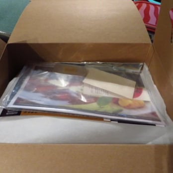 Recipieces - a cardboard box with food in it - Food Delivery Services Near Me