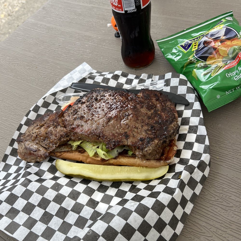Jadaa’s Kitchen - This is my fav!!! Ribeye steak sando!! Hahaha on a bun under it!! It's always falling over the edge of the plate!!! Best $20 I have spent! - Food Trucks Near Me - Downieville, California Jadaa’s Kitchen - This is my fav!!! Ribeye steak sando!! Hahaha on a bun under it!! It's always falling over the edge of the plate!!! Best $20 I have spent! - Food Trucks Near Me - Downieville, California
