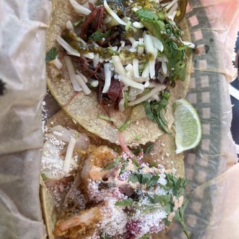 Torchy's Tacos - CROSSROADS TACO SMOKED BEEF BRISKET ( on the left) BAJA SHRIMP FRIED SHRIMP(on the right ) both 8.5/10 - Tex-Mex Near Me - Raleigh, North Carolina Torchy's Tacos - CROSSROADS TACO SMOKED BEEF BRISKET ( on the left) BAJA SHRIMP FRIED SHRIMP(on the right ) both 8.5/10 - Tex-Mex Near Me - Raleigh, North Carolina