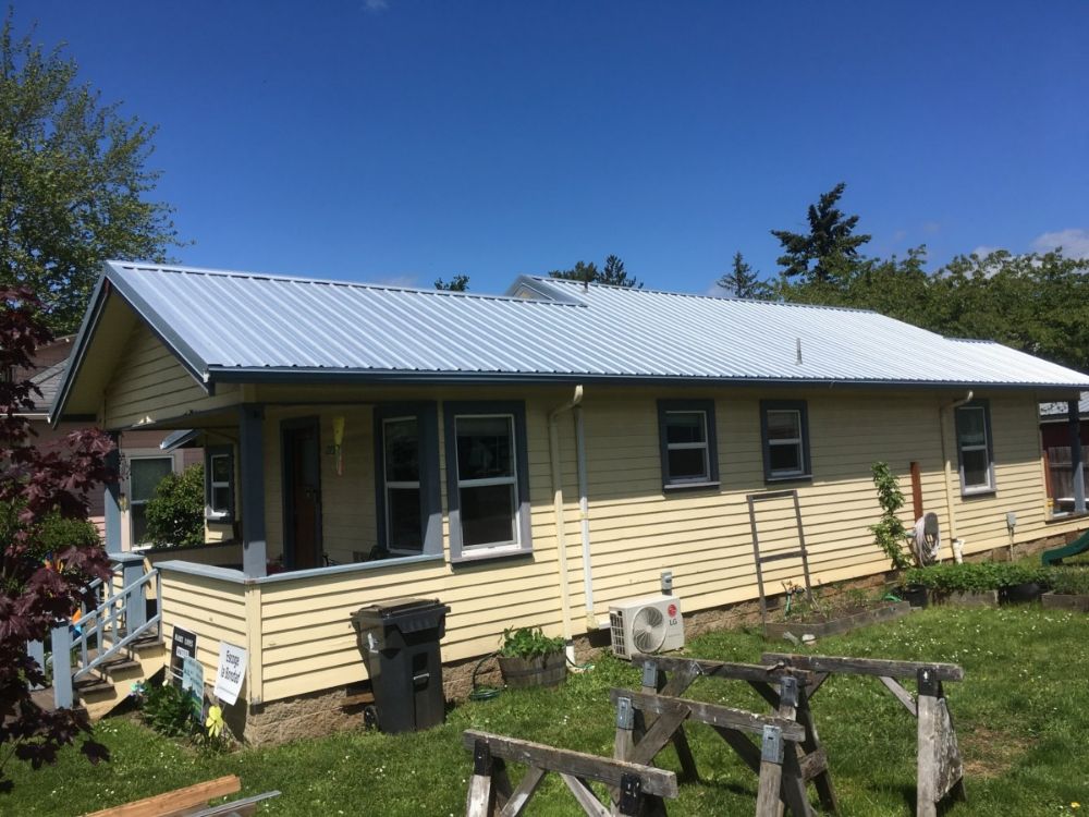 Slide of Cisneros Roofing