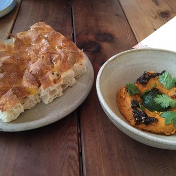 Squable - Focaccia with a spiced carrot spread - the bread was crisp and the spread had the right amount of spice and punch. - Modern European Near Me - Houston, Texas Squable - Focaccia with a spiced carrot spread - the bread was crisp and the spread had the right amount of spice and punch. - Modern European Near Me - Houston, Texas