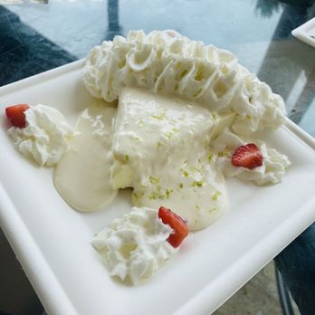 Seaside Cafe - Key lime pie with piña colada cream on top - Pizza Near Me - Key West, Florida Seaside Cafe - Key lime pie with piña colada cream on top - Pizza Near Me - Key West, Florida