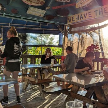 Dune Dog Cafe - , as you're having lunch or dinner you could look at all the things hanging on the walls - American Near Me - Jupiter, Florida Dune Dog Cafe - , as you're having lunch or dinner you could look at all the things hanging on the walls - American Near Me - Jupiter, Florida