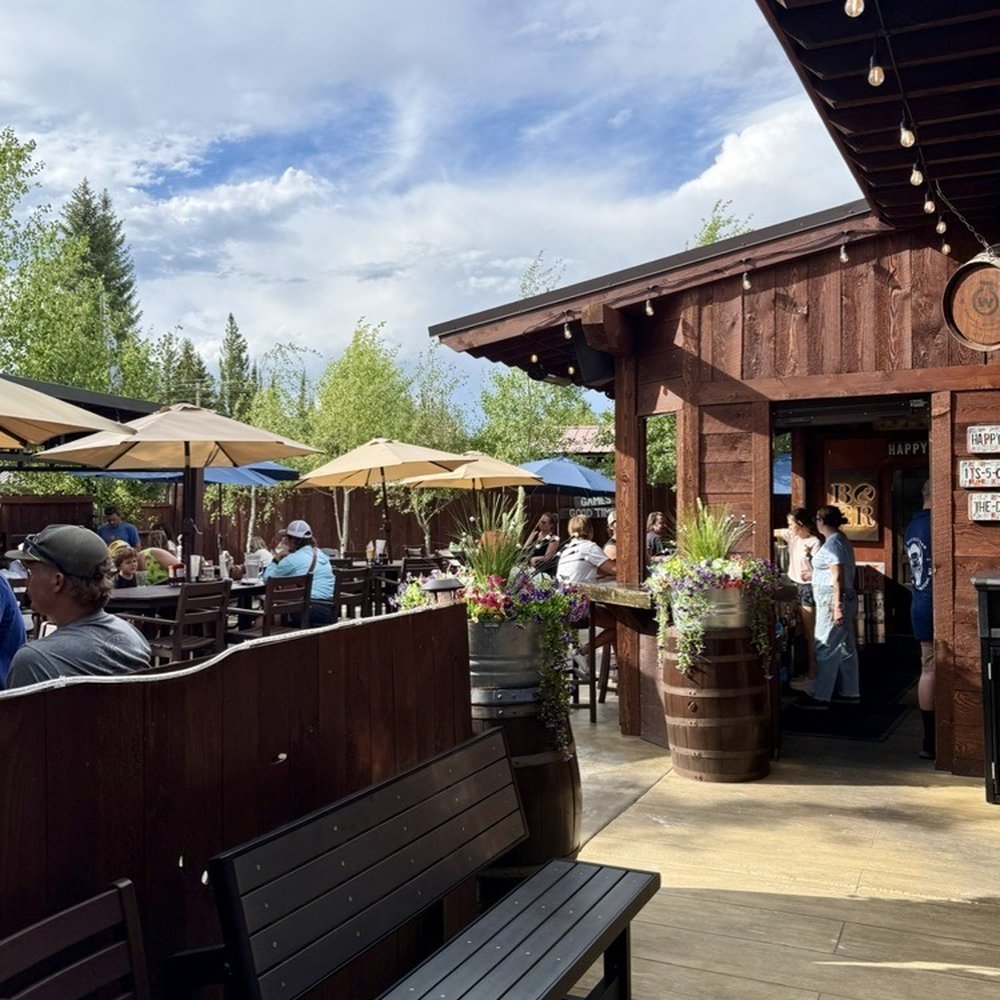 The Buffalo Bar - As you enter, a right would take you indoors. We sat to the left. That's the outdoor bar ahead. - American Near Me - West Yellowstone, Montana The Buffalo Bar - As you enter, a right would take you indoors. We sat to the left. That's the outdoor bar ahead. - American Near Me - West Yellowstone, Montana