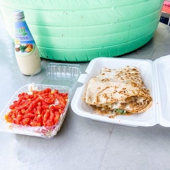Gutierrez Deli - a plate of quesadillas and a container of tomatoes - Imported Food Near Me - Covington, Kentucky Gutierrez Deli - a plate of quesadillas and a container of tomatoes - Imported Food Near Me - Covington, Kentucky