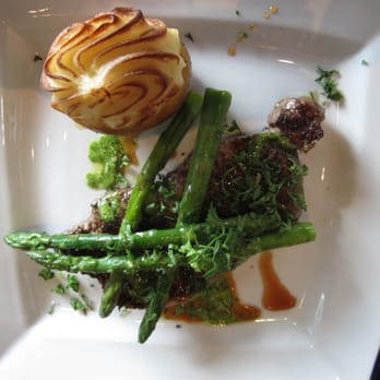 Masraff's - Certified Angus 11oz NY strip steak truffled restuffed gold potato, and buttered asparagus - New American Near Me - Houston, Texas