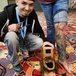 Curtis Daniel's Tattoo Studio - Curtis Daniel with a 1st. place trophy for best Louisiana theme tattoo!