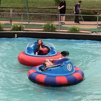 Goofy Golf - My sister and I riding the bumper boats. This was really fun. - Mini Golf Near Me - Sandusky, Ohio