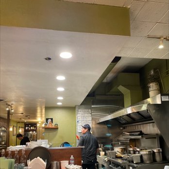 Bamboo Thai Cuisine - Open kitchen.   So It gets noisy is you sit up front.  Unless you like watch them cook.  I'm sitting in front. - Thai Near Me - Seattle, Washington