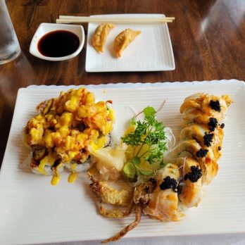 Asahi Sushi - Baby Lobster Roll the left (good), Black Widow on the right (phenomenal) - Sushi Bars Near Me - Olympia, Washington Asahi Sushi - Baby Lobster Roll the left (good), Black Widow on the right (phenomenal) - Sushi Bars Near Me - Olympia, Washington