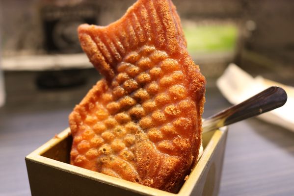 Kura Revolving Sushi Bar by null