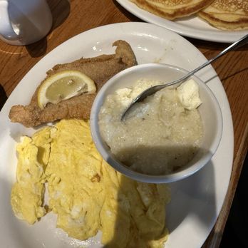 Cracker Barrel - Fried catfish scrambled eggs, grits and crispy edges pancakes. - Breakfast & Brunch Near Me - Fishkill, New York
