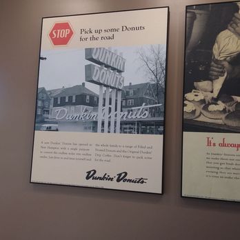 Dunkin' -  a stop sign and a poster on the wall - Coffee & Tea Near Me - Kissimmee, Florida