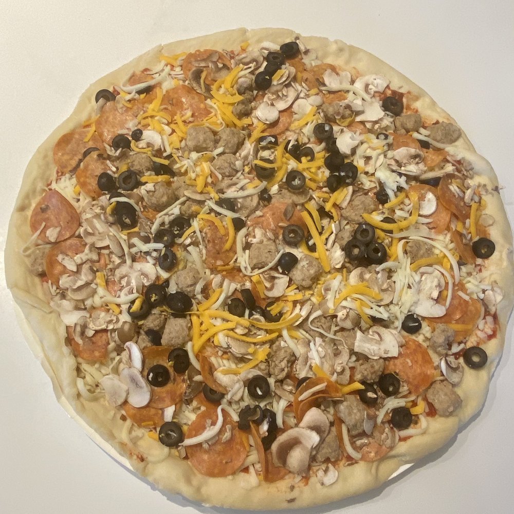 Family sized Cowboy, w extra (where??) cheese. Family sized Cowboy, w extra (where??) cheese.