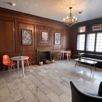 The Roaming Biscuit - a living room with wood paneling - Sandwiches Near Me - Cleveland, Ohio The Roaming Biscuit - a living room with wood paneling - Sandwiches Near Me - Cleveland, Ohio