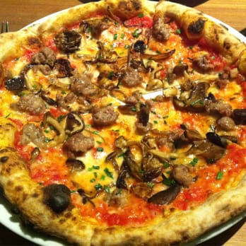 Novo Italian - Truffled mushroom pizza with added Italian sausage. - Wine Bars Near Me - Vancouver, British Columbia Novo Italian - Truffled mushroom pizza with added Italian sausage. - Wine Bars Near Me - Vancouver, British Columbia