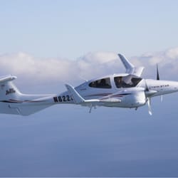 Skill Aviation - One of Skill Aviation's DA-42 Twin Stars flying over Lake Michigan