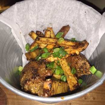 District Saigon - Chicken wings with taro fries - Vietnamese Near Me - Astoria, New York District Saigon - Chicken wings with taro fries - Vietnamese Near Me - Astoria, New York