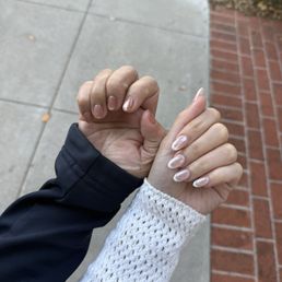 Two hands showing nails