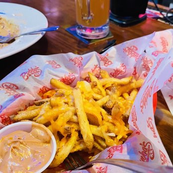 Bubba's 33 - Cheese fries with Bubba's sauce and beer. - Pizza Near Me - Colorado Springs, Colorado