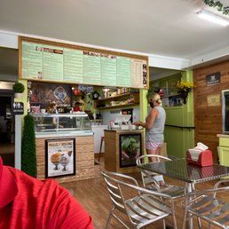 a woman standing in the kitchen a woman standing in the kitchen