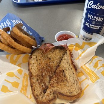 Culver's - Reuben with onion rings - Burgers Near Me - Pueblo, Colorado Culver's - Reuben with onion rings - Burgers Near Me - Pueblo, Colorado