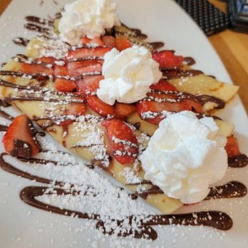 Broken Yolk Cafe - Nutella Crepes with Strawberries - Breakfast & Brunch Near Me - Las Vegas, Nevada Broken Yolk Cafe - Nutella Crepes with Strawberries - Breakfast & Brunch Near Me - Las Vegas, Nevada