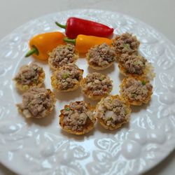 Pauline's Catering and Staffing - Wow your guests with our exquisite peppercorn-crusted sushi-grade tuna, paired with crisp jicama and a zesty lime twist.