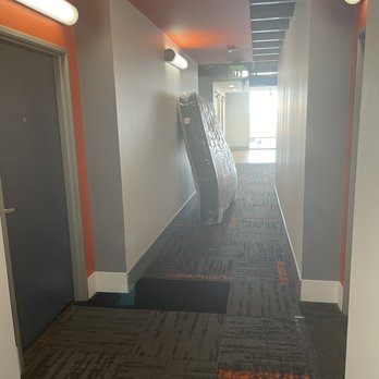 American Van Lines - This photo is of my mattress left in the hallway unattended. - Movers Near Me - Pompano Beach, Florida