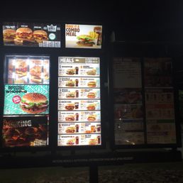 Drive thru menu at 9pm--half lit & ridiculous.
