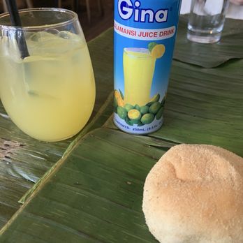 Perla - The start of the meal with a light roll, and a fancy lemonade-type drink (extra cost). - Filipino Near Me - Philadelphia, Pennsylvania Perla - The start of the meal with a light roll, and a fancy lemonade-type drink (extra cost). - Filipino Near Me - Philadelphia, Pennsylvania