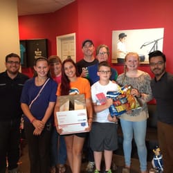 Students (Group 1) after their volunteer work of packing items to ship to our troops overseas.