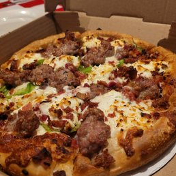 Custom small pizza: sausage, green peppers, red onions and ricotta cheese Custom small pizza: sausage, green peppers, red onions and ricotta cheese