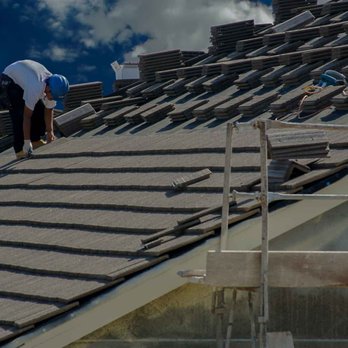 Stanislaus Construction - a man working on a roof - General Contractors Near Me Stanislaus Construction - a man working on a roof - General Contractors Near Me